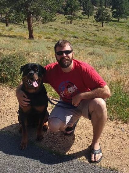 Matt Founder of Evergreen Natural Pet CBD Supplements for Dogs with Koa his rottweiler