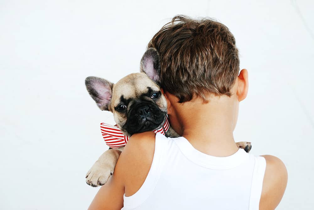 Kid and dog | 5 Benefits of Pet Ownership For Kids | Evergreen Natural Pet